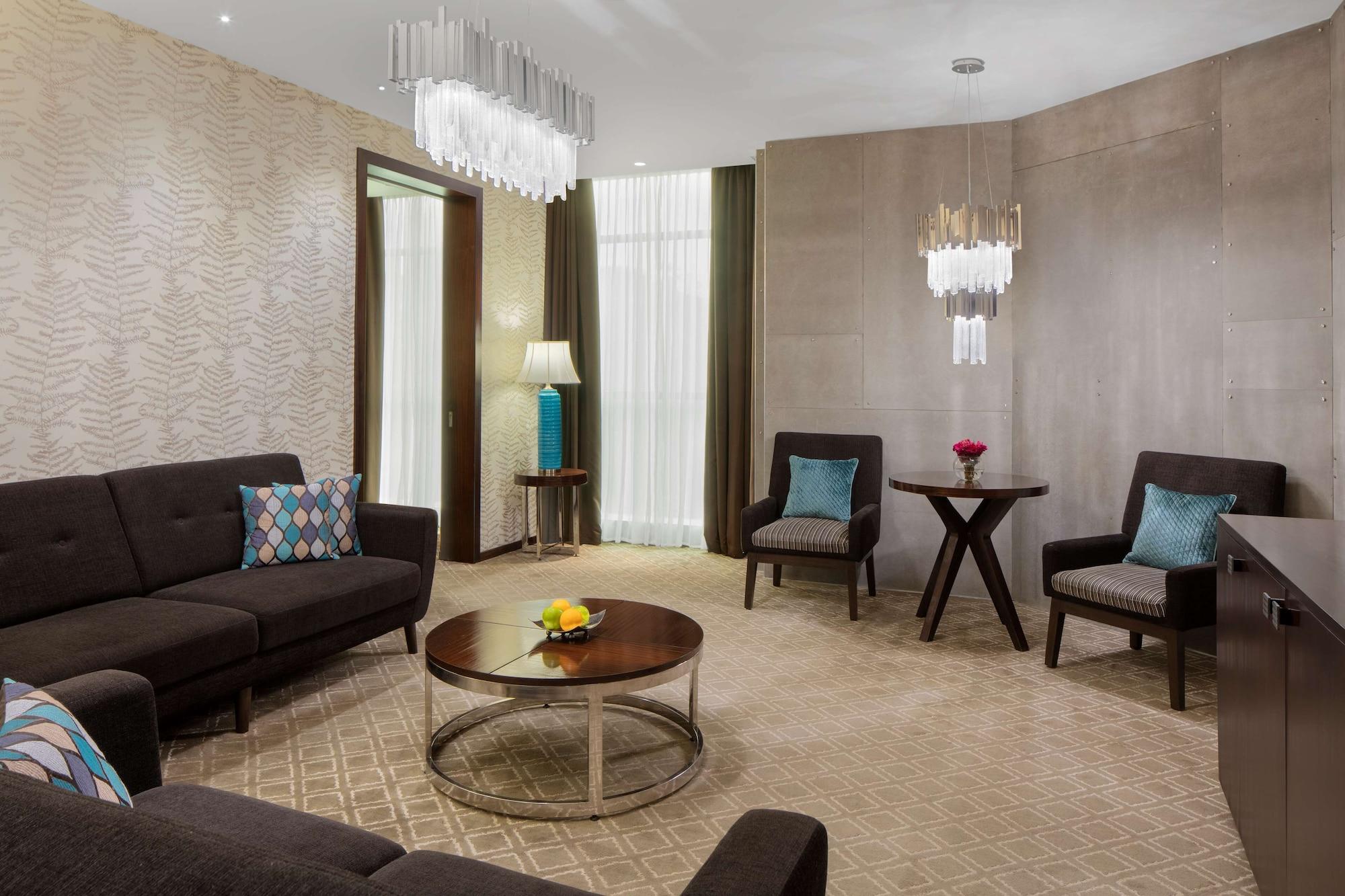 מלון Radisson Blu Atria Bengaluru מראה חיצוני תמונה A suite at the hotel