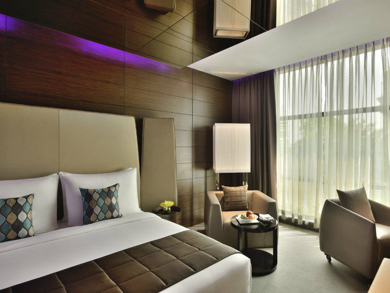 מלון Radisson Blu Atria Bengaluru מראה חיצוני תמונה A room at the hotel